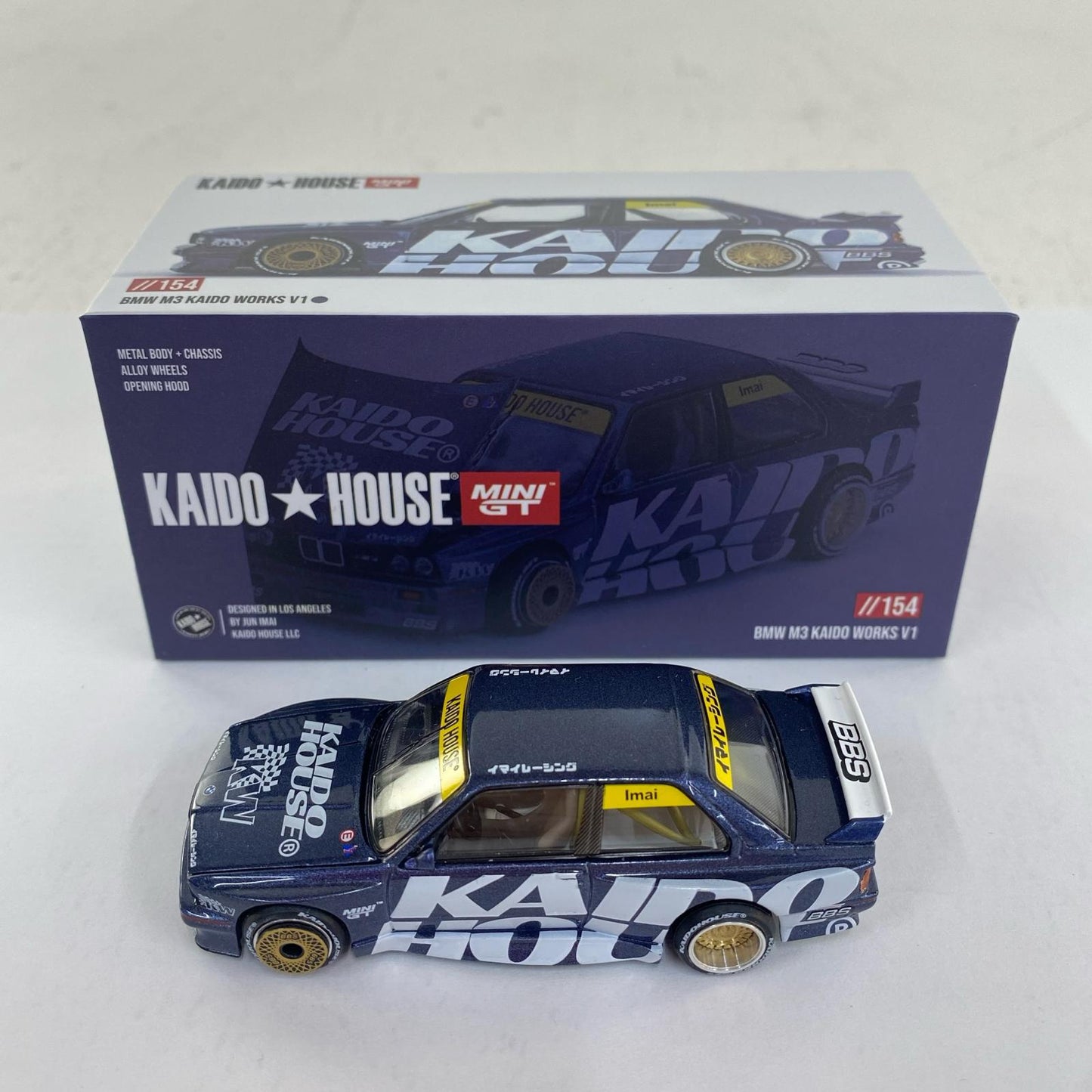 1/64 BMW M3 (E30) Kaido Works V1 (Left-Hand Drive) "KAIDO HOUSE x MINI GT Series" [KHMG154]