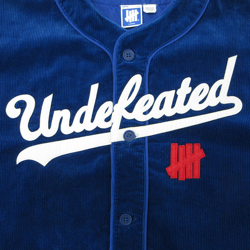 UNDEFEATED | アンディフィーテッド CORD S/S BASEBALL JERSEY コーデュロイベースボールシャツ ロゴ半袖シャツ ファイブストライクス 半袖シャツ ブルー ネイビー サイズ：L【三重本店】