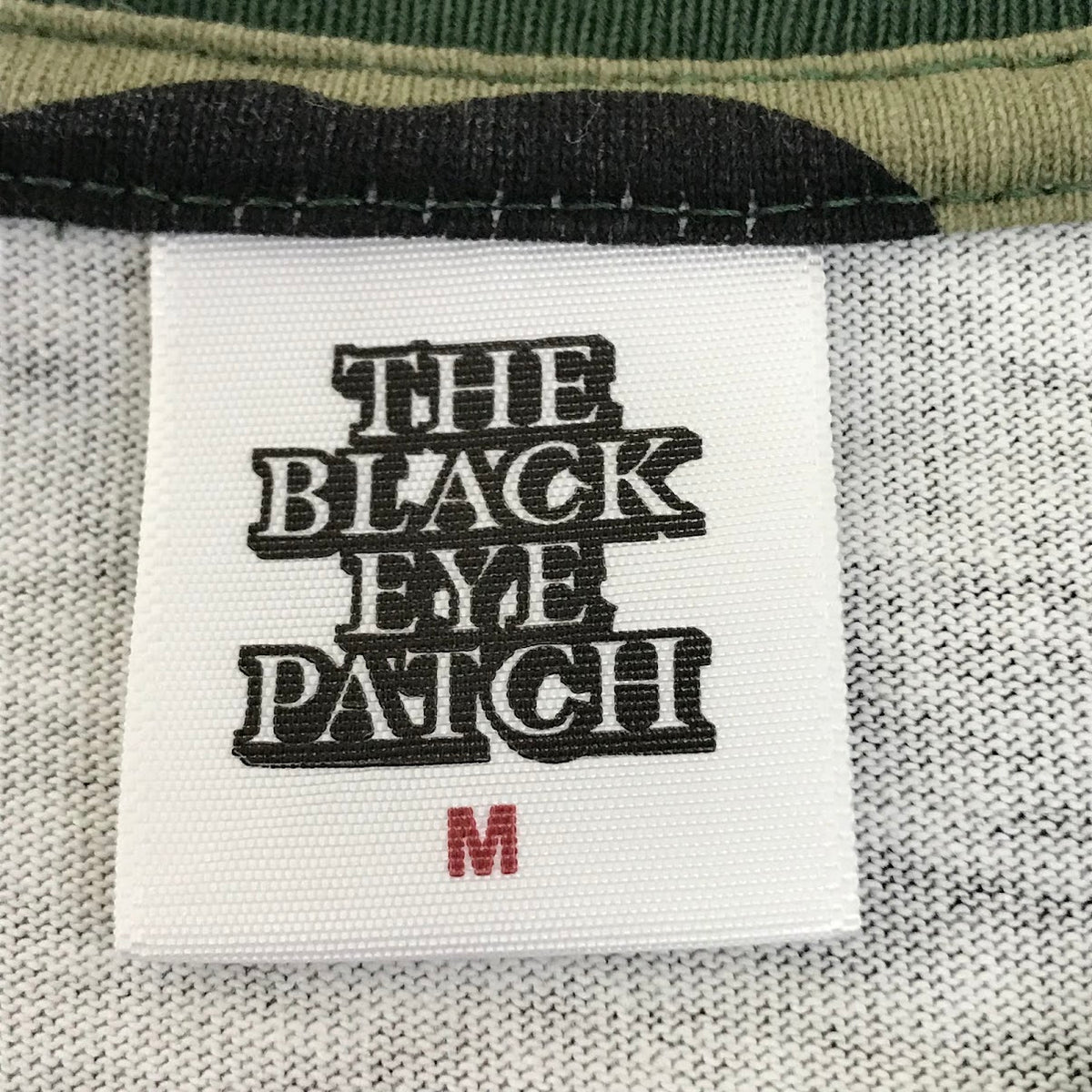 BlackEyePatch | ブラックアイパッチ RHINESTONED URBAN STAR LOGO TEE 半袖Ｔシャツ カモ サイズ：M【倉吉店】【代金引換不可・日時指定不可】【ポスト投函】