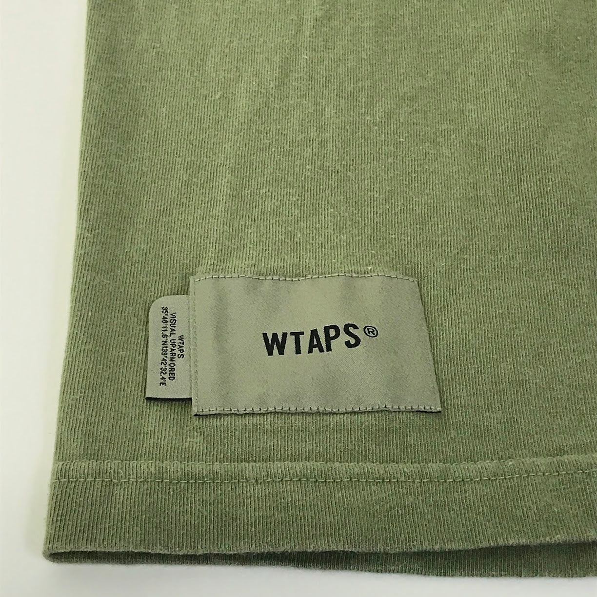 W)TAPS | ダブルタップス LABEL/SS/COTTON 半袖Ｔシャツ 231ATDT-STM08S カーキグリーン サイズ：4【倉吉店】