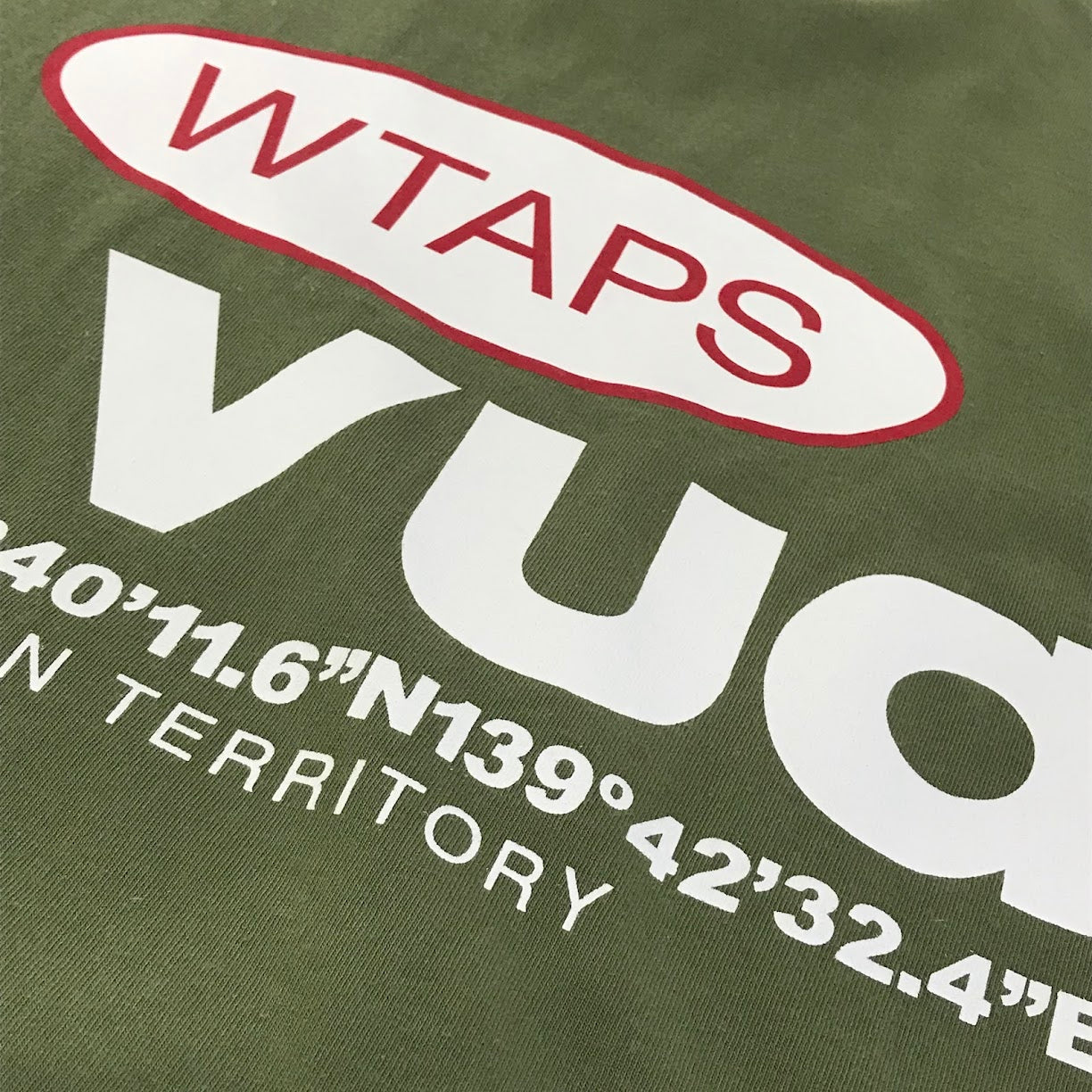 W)TAPS | ダブルタップス LABEL/SS/COTTON 半袖Ｔシャツ 231ATDT-STM08S カーキグリーン サイズ：4【倉吉店】