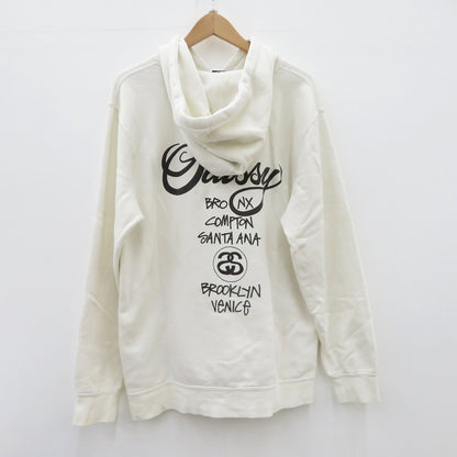 STUSSY | ステューシー パーカー WORLD TOUR HOODIE 長袖 ホワイト サイズ：M