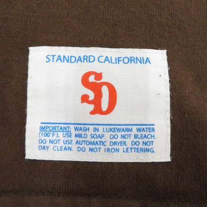 STANDARD CALIFORNIA | スタンダードカリフォルニア ﾌｯﾄﾎﾞｰﾙ 半袖Ｔシャツ ブラウン サイズ：M【瀬戸大橋店】