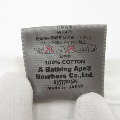A BATHING APE | アベイシングエイプ ｹﾞｰﾑﾀｸﾞ NIGOﾛｺﾞ 半袖Ｔシャツ ホワイト サイズ：L【瀬戸大橋店】