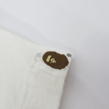 A BATHING APE | アベイシングエイプ ｹﾞｰﾑﾀｸﾞ NIGOﾛｺﾞ 半袖Ｔシャツ ホワイト サイズ：L【瀬戸大橋店】